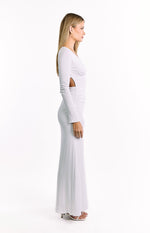 Side view of a white long sleeve maxi dress with a side waist cutout and ruched detailing