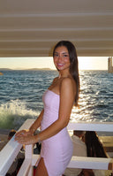 Beginning Boutique Let Go Baby Pink Ruched Mini Dress baby pink strapless bodycon mini dress with side ruching and a thigh sl