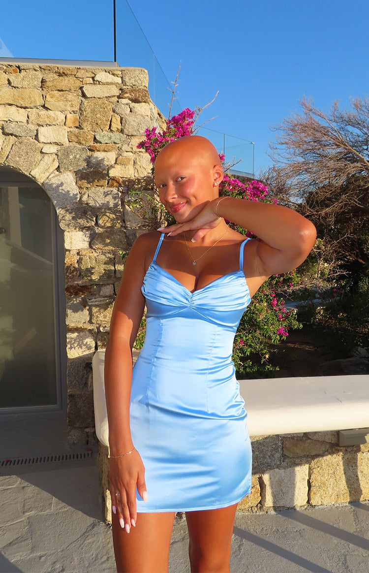 Light blue satin mini dress with a ruched sweetheart neckline and thin spaghetti straps