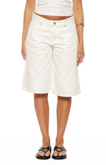 Front view of white wide-leg denim shorts featuring a button-front closure, belt loops, and front pockets, cut to above the knee