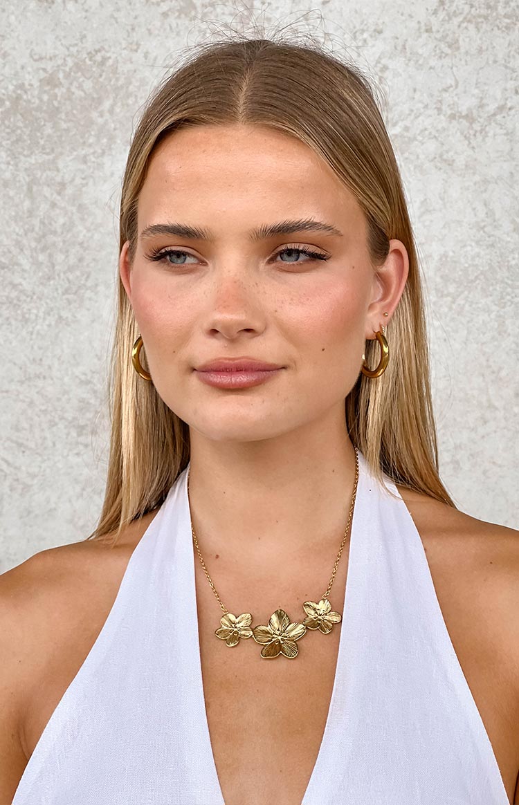Beginning Boutique Halo Gold Frangipani Trio Necklace gold delicate chain necklace with three detailed frangipani flower pendants