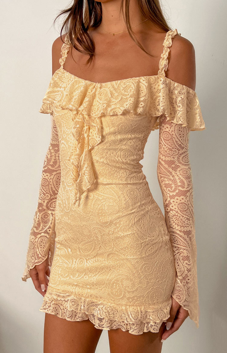 Beginning Boutique Harlow Cream Lace Mini Dress cream lace off-shoulder mini dress with long sleeves and ruffled details
