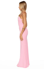 Side view of a pink crepe maxi dress with thin spaghetti straps and lace-up side detail on the bodice