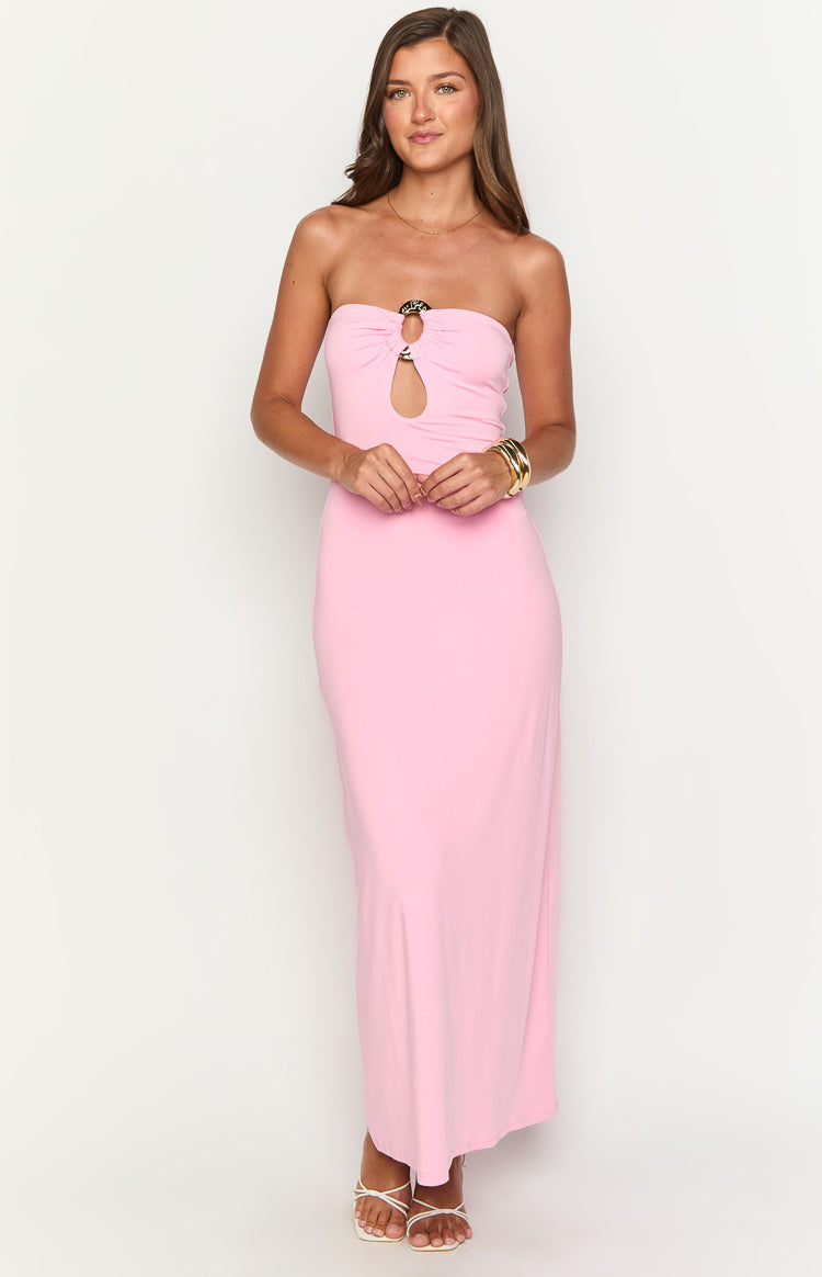 Pink strapless maxi dress with a gold ring detail and keyhole cutout at the bust