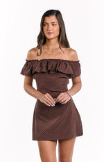 Brown polka dot mini dress with a wide gathered ruffle off-shoulder neckline
