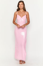 Front view of a honey pink sequin maxi dress with a V-neckline and thin spaghetti straps