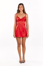 Red satin mini dress with a ruched sweetheart neckline and delicate spaghetti straps