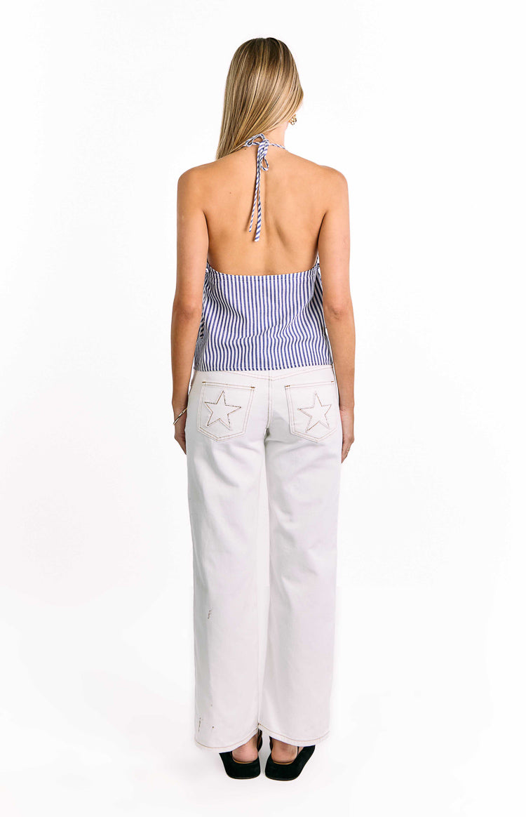 Rear view of a blue and white striped halter neck top with an open back and tie detail