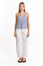 Blue and white striped halter neck top with a deep V-neckline, gathered bodice, and side tie details