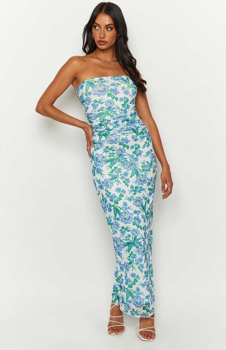 White strapless maxi dress with blue and green floral print and ruched detailing