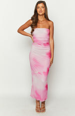 Front view of a pink and white abstract print strapless maxi dress with side ruching