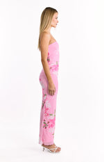 Side view of the pink and green floral print strapless maxi dress with ruched side detail