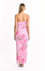Rear view of the pink and green floral print strapless maxi dress, showing the fitted silhouette and subtle ruching