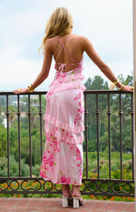 Front view of a pink floral print satin maxi dress with tiered sheer ruffles and V-neckline