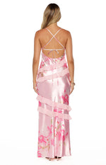 Close-up of the pink satin V-neckline with sheer ruffles and pink floral print on a maxi dress
