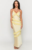 Beginning Boutique Inara Yellow Ruffle Maxi Dress yellow satin V-neck maxi dress with ruffled neckline, spaghetti straps, and cascading ruffles