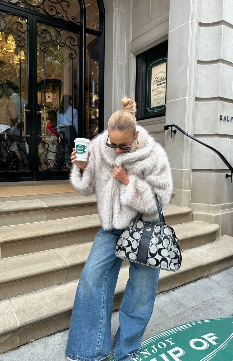 Sand faux fur jacket with a wide plush collar and relaxed fit