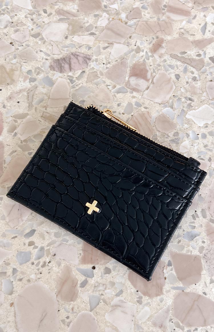 black croc textures card holder with a gold detail on the front and gold zip