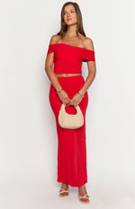 Front view of a red bodycon maxi skirt with a high waist and floor-length hem