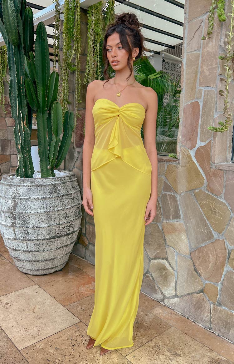 Front view of a yellow maxi skirt in a sheer, flowy fabric with an opaque lining