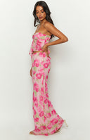 Pink floral print maxi skirt with a sheer overlay, featuring large pink and red flowers