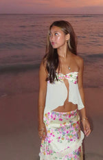 Yellow bloom strapless top featuring a tie-front bust and flowy open front design with sheer panels
