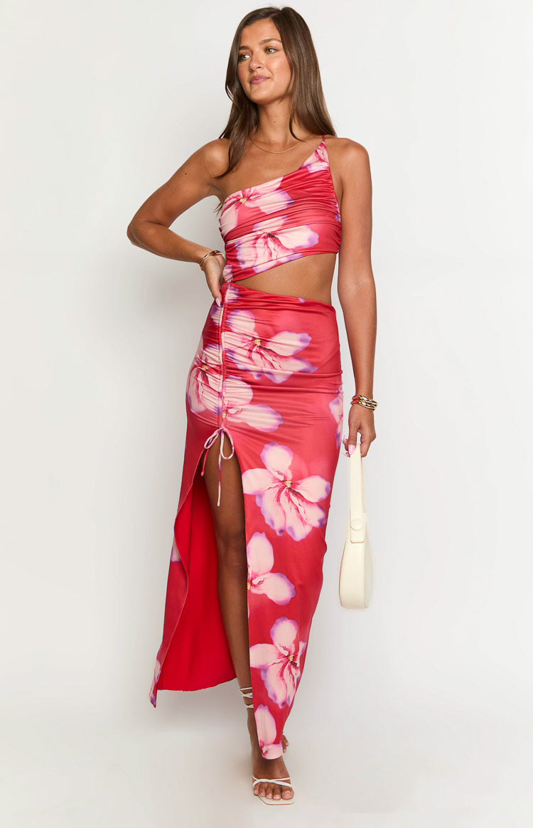 Red floral one-shoulder maxi dress with a midriff cut-out and ruched drawstring detail creating a high side slit