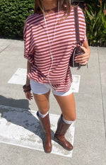 Beginning Boutique Jannika White Foldover Micro Shorts white fitted micro shorts with a foldover waistband
