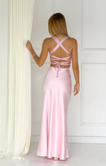 Rear view of a pink satin maxi dress with rhinestone criss-cross back straps and tie waist