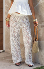 Beginning Boutique Jev White Lace Pants white sheer floral lace wide-leg pants with an elasticated waist