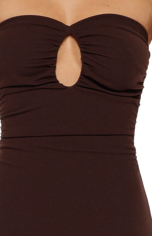 Close-up of the brown crepe strapless maxi dress bodice with keyhole cutout and ruched detailing