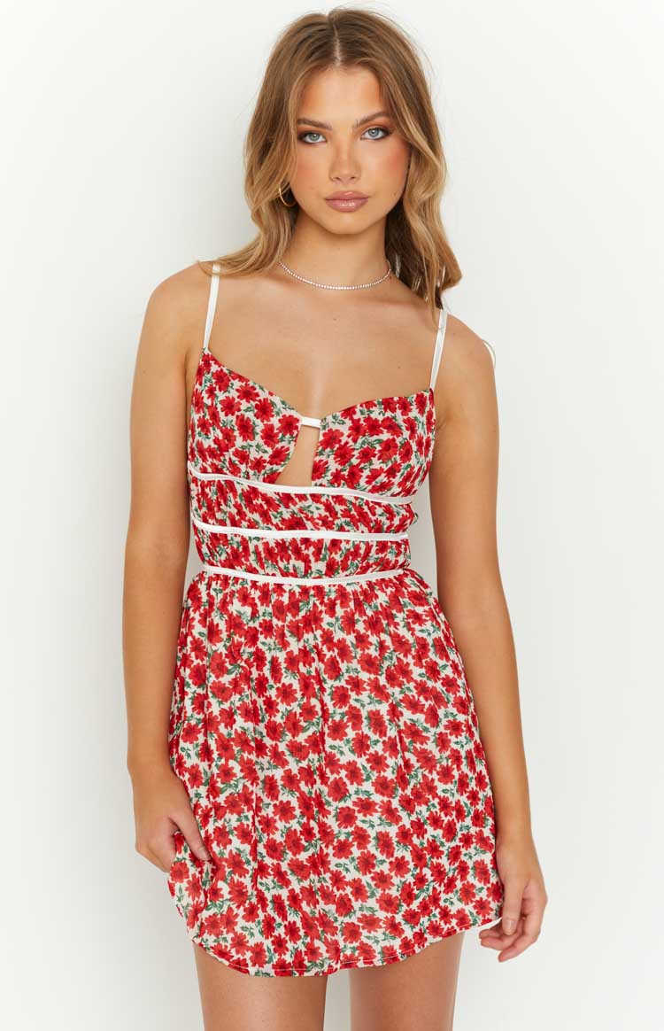 Beginning Boutique Kandi Red Floral Mini Dress red floral print mini dress with sweetheart neckline cutout white spaghetti straps and ruched midriff