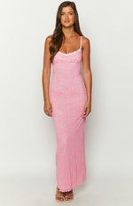 Pink floral lace maxi dress with a white lace trim scoop neckline and thin spaghetti straps