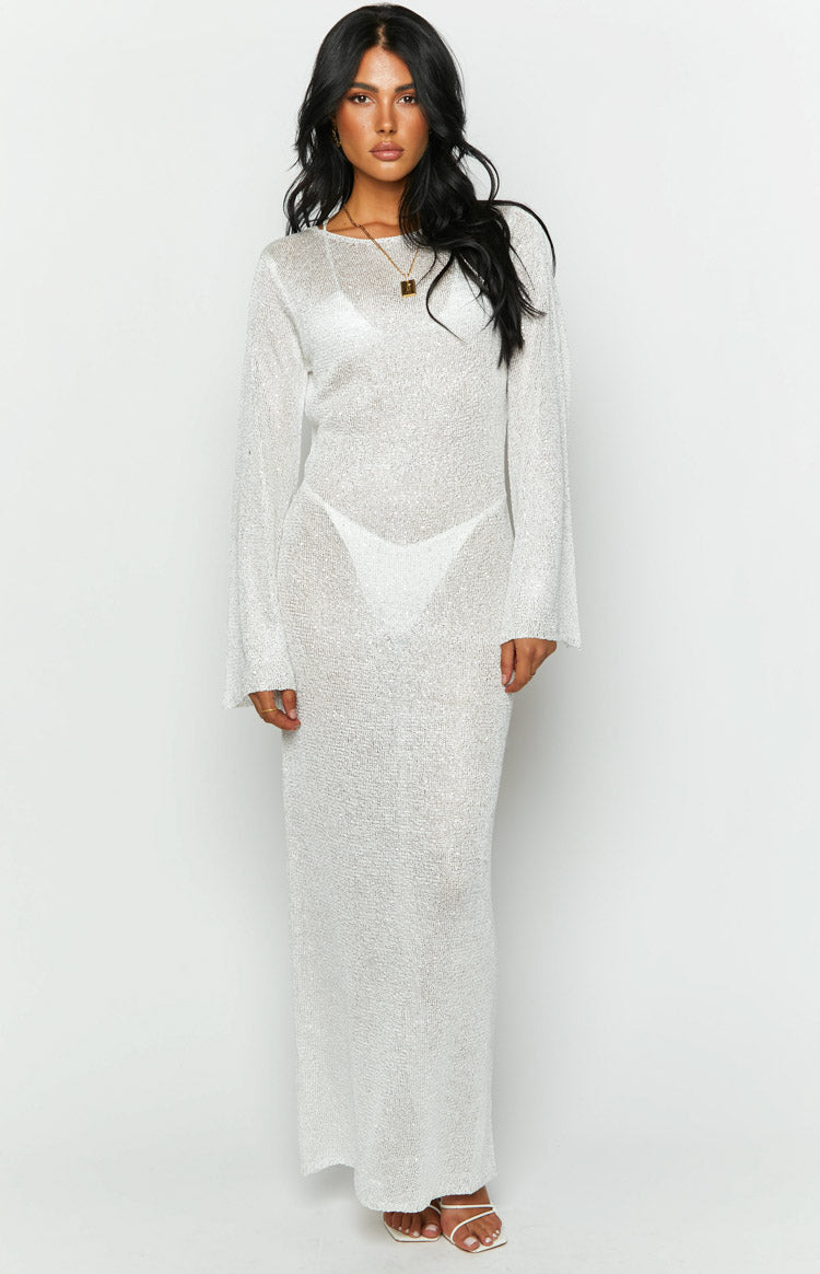 Front view of a sheer white sequin knit long sleeve maxi dress with a round neckline