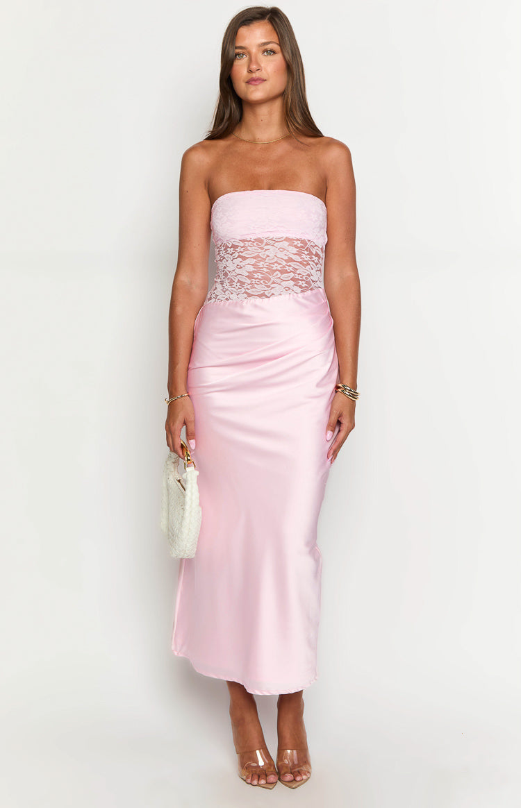 Pink strapless maxi dress with a sheer white lace bodice and a flowing satin skirt