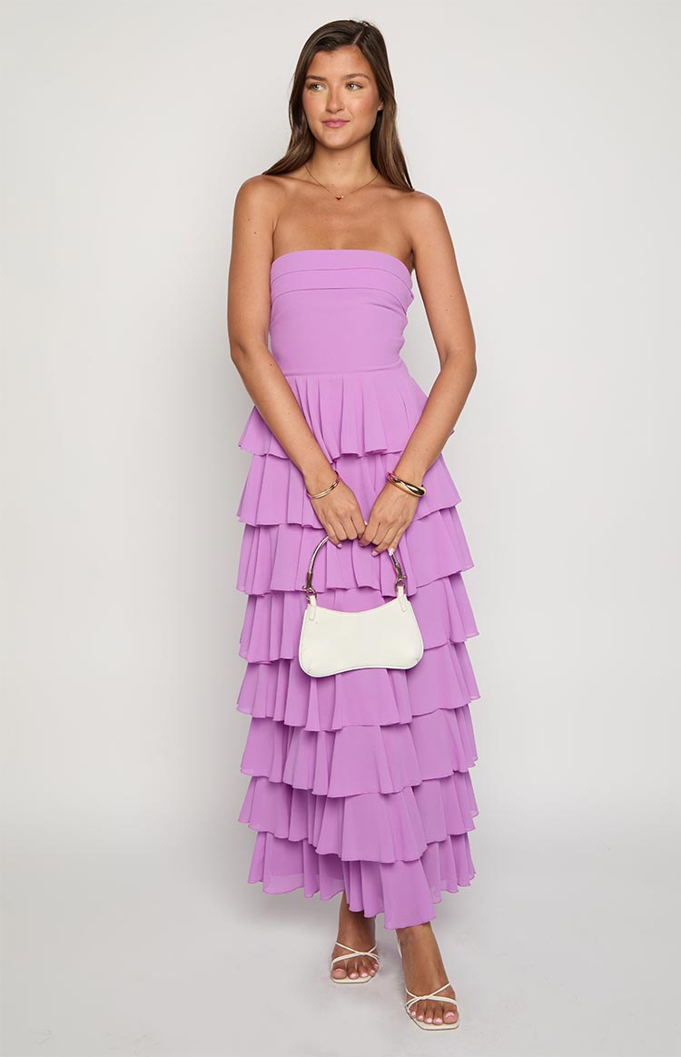 Full-length front view of a lavender strapless maxi dress with a fitted bodice and a full tiered ruffle skirt