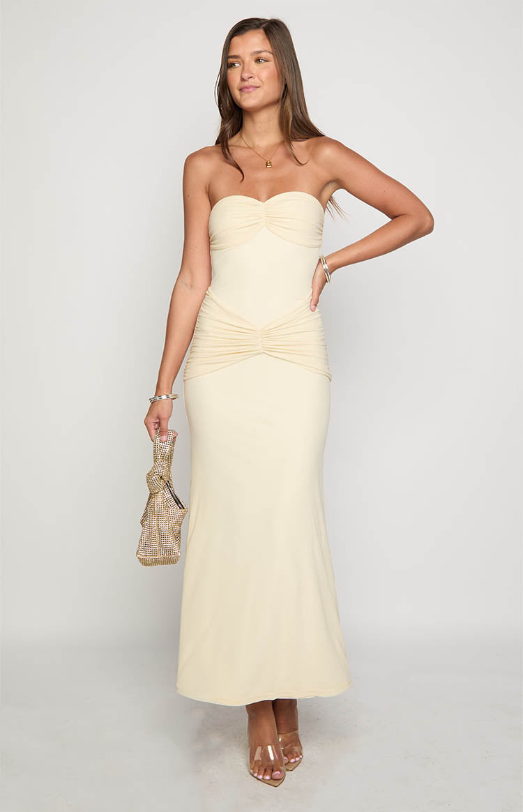 Cream strapless maxi dress with ruched sweetheart neckline and ruched waist detail