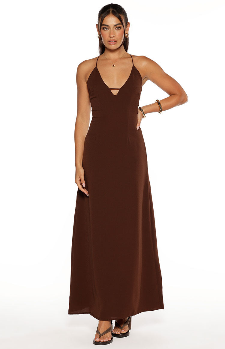 Brown V-neck maxi dress with thin spaghetti straps and a horizontal strap detail across the bust