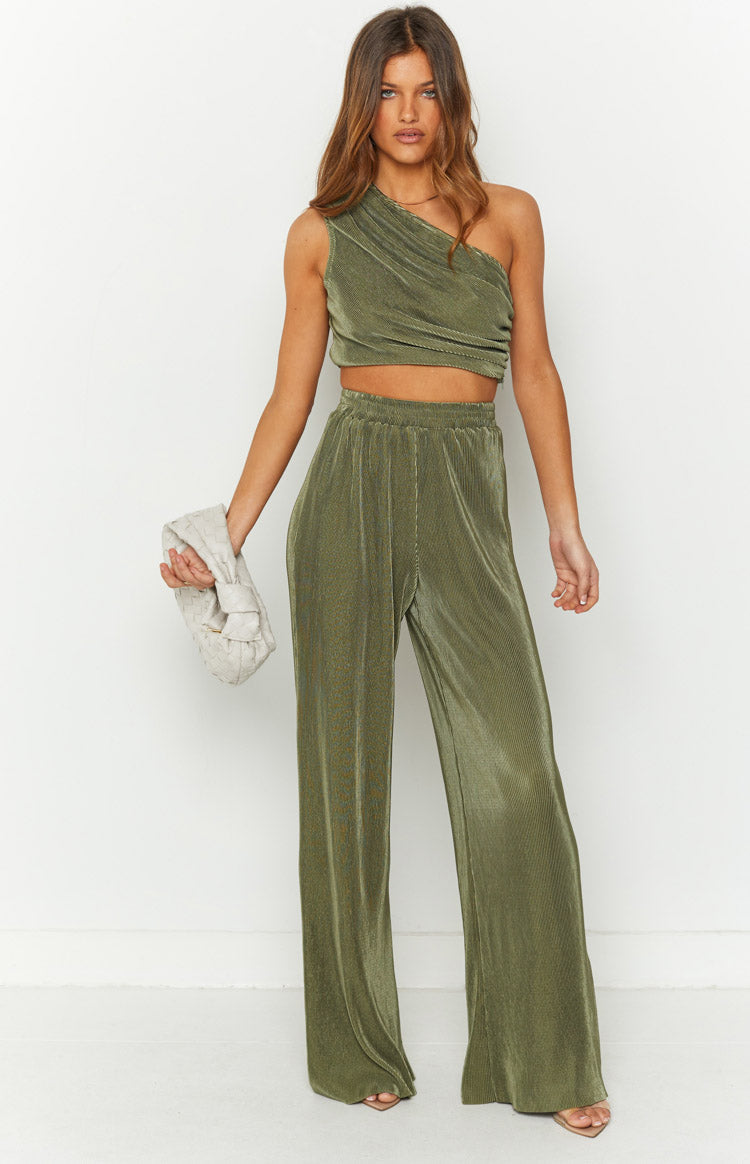 Front view of khaki pleated wide-leg pants with an elasticated waist and a flowing silhouette