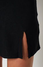 Black textured mini skirt with a side slit detail