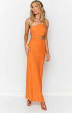 Front view of an orange one-shoulder maxi dress with side waist cutouts and a twisted bodice detail