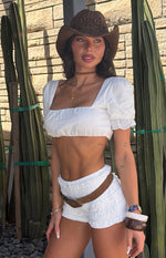 White broderie trim crop top with a square neckline and short puff sleeves