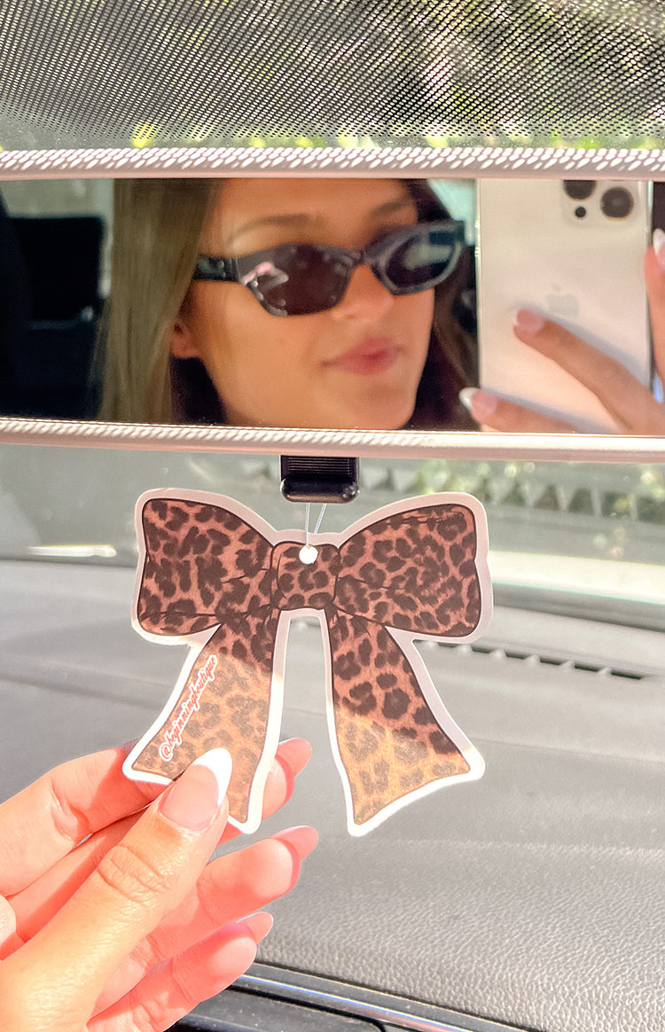 Beginning Boutique Leopard Print Bow Air Freshener leopard print bow-shaped air freshener with a hanging string