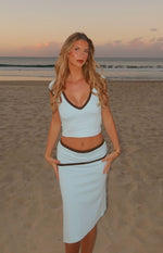 Beginning Boutique Levi Blue Contrast Bind Jersey Top light blue jersey crop top with brown contrast V-neck and cap sleeves