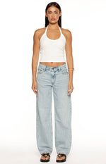 Light wash blue baggy dad jeans with a relaxed wide-leg fit and classic five-pocket styling