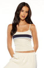 Cream singlet with a straight neckline and thin spaghetti straps, featuring navy and light blue horizontal contrast stripes