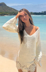 White crochet V-neck mini dress with long bell sleeves and scalloped openwork hem