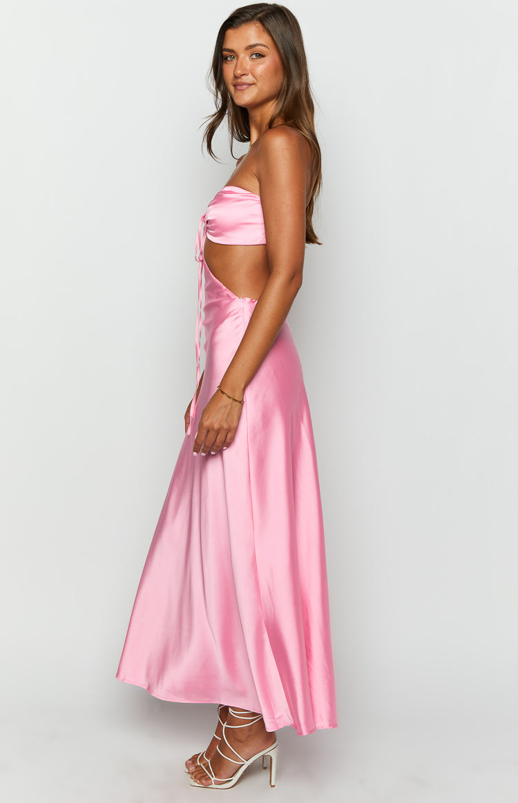 Side view of a pink satin strapless maxi dress with tie-front bust and side cutouts