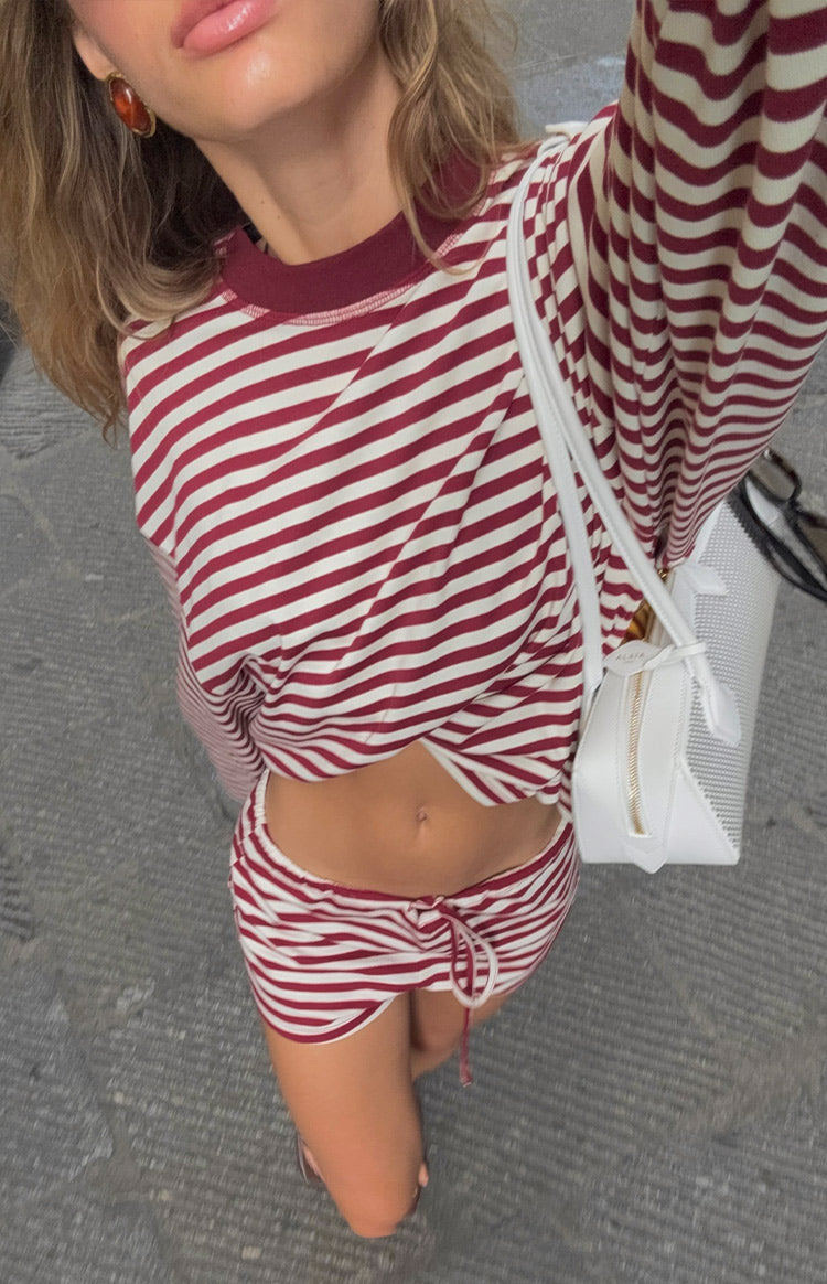 Wine and white striped long sleeve top with a ribbed crew neck, tied at the front