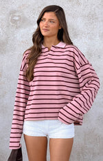 Blush pink and burgundy stripe jersey with a collared V-neck, dropped shoulders, and relaxed long sleeves